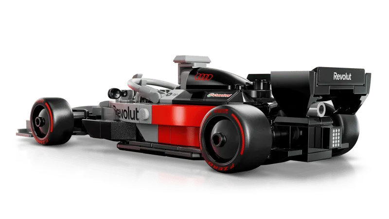 Left side view of the assembled LEGO Audi Revolut F1 Team R26 Race Car 77259, highlighting its aerodynamic shape and sponsors in grey, red, and black.