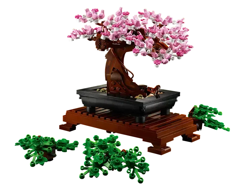 Pink bonsai tree with extra leaves.