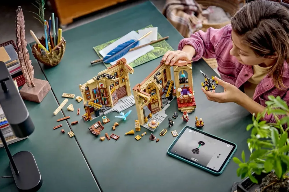 Child Building LEGO Set.