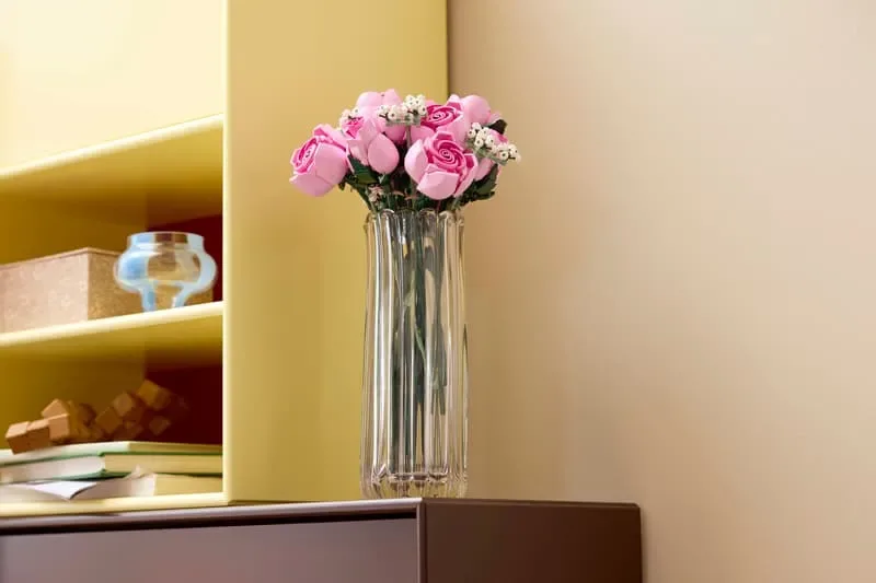 Roses in vase, home display.