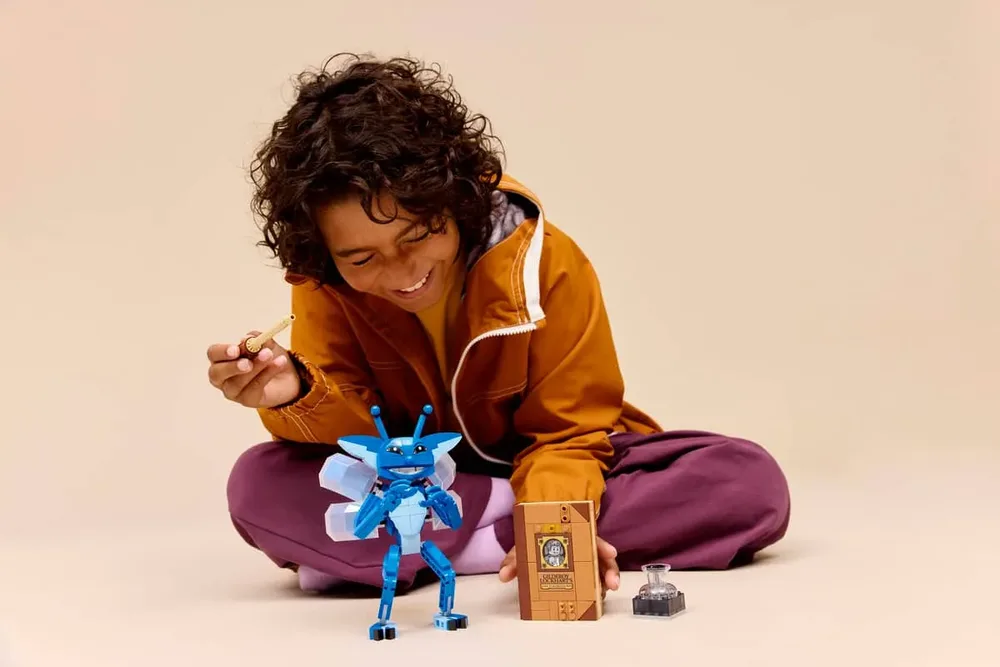 Child playing with Pixie set.