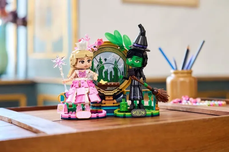 Lego Elphaba & Glinda figures on display.