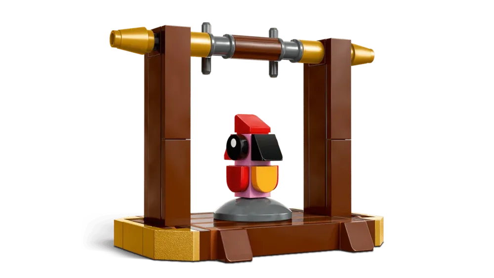 Close-up of the mini Fawkes figure on its perch.