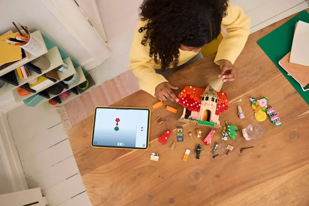 Child building LEGO Wicked.