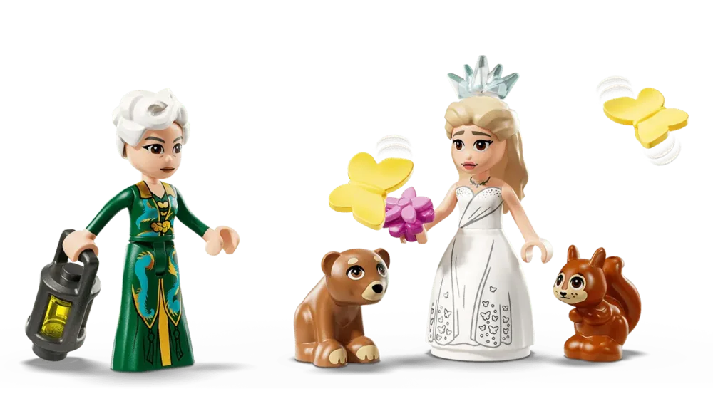 Glinda, Elphaba, and animal figures.