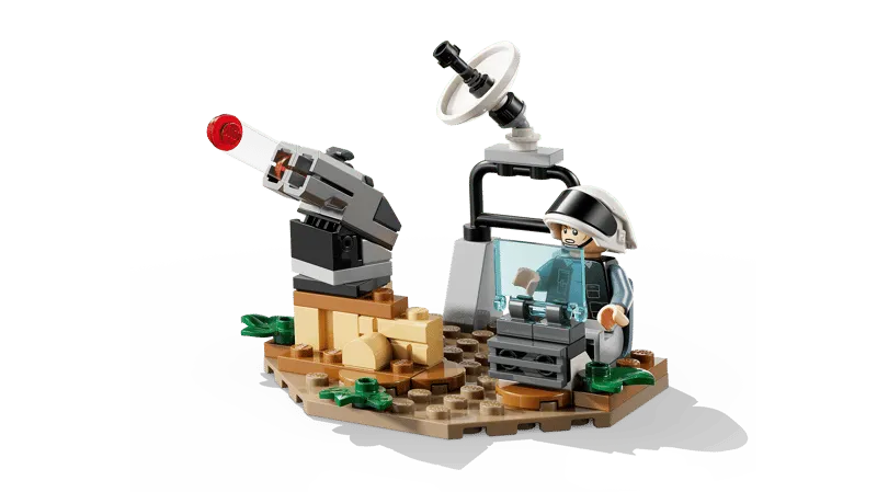 Close-up of the buildable Rebel defense turret with a Rebel Fleet Trooper minifigure, featuring a communication dish, blaster cannon, and control console.