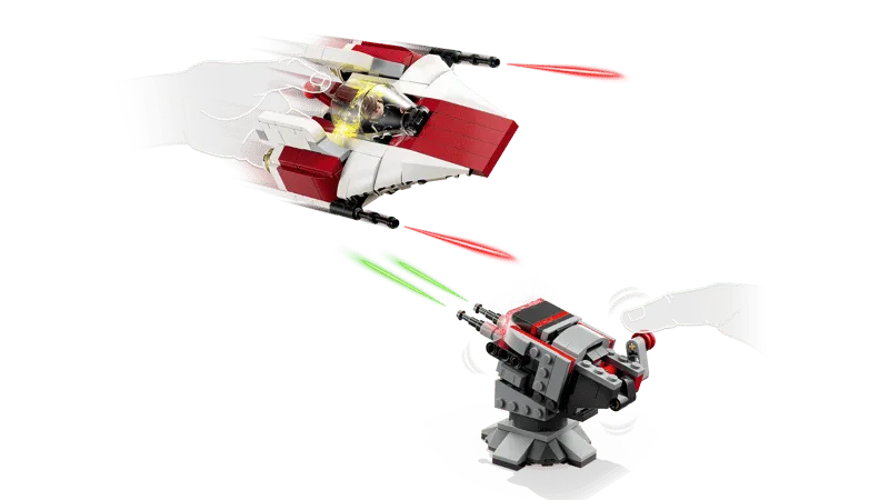 LEGO Star Wars 75427 A-Wing fighter in flight, firing laser blasts, while a ground turret is also shown firing, with a hand activating its mechanism.