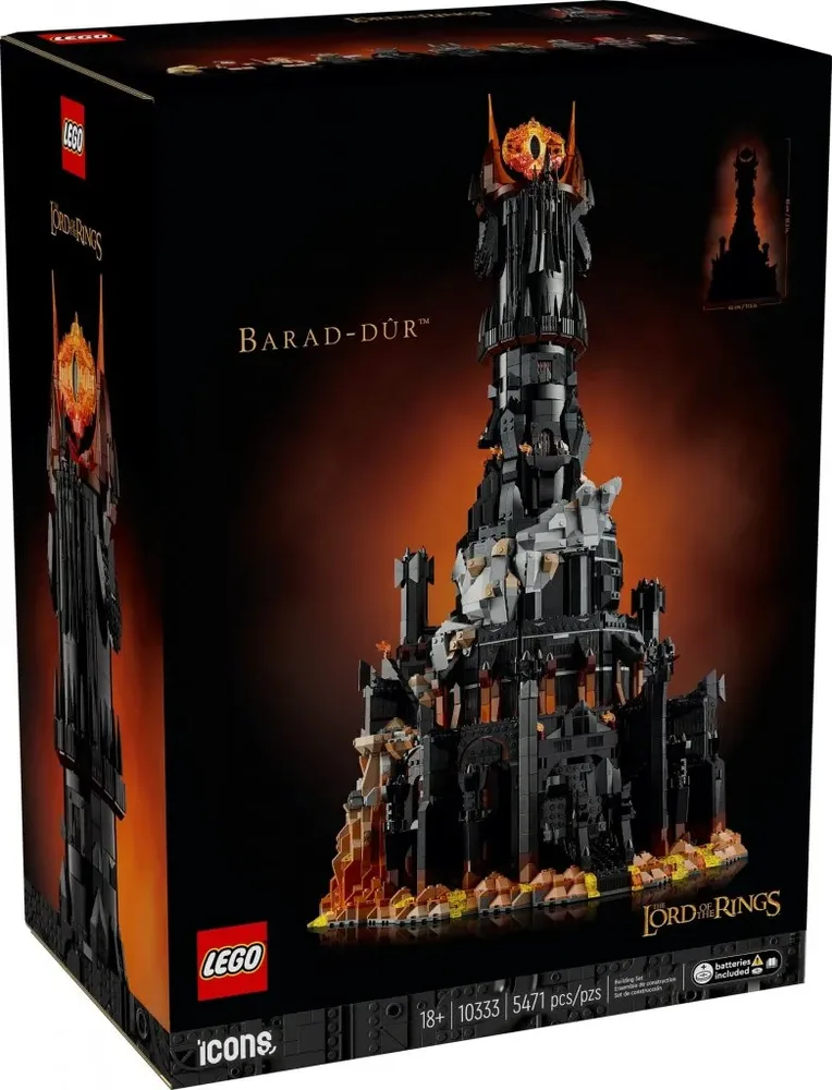 A close-up of the Lego Barad-dûr box, showcasing the towering black fortress with the Eye of Sauron at its peak, against a fiery orange background.