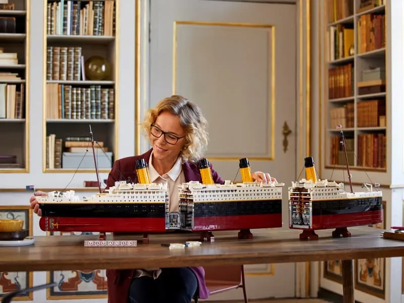 Woman assembling LEGO Titanic.