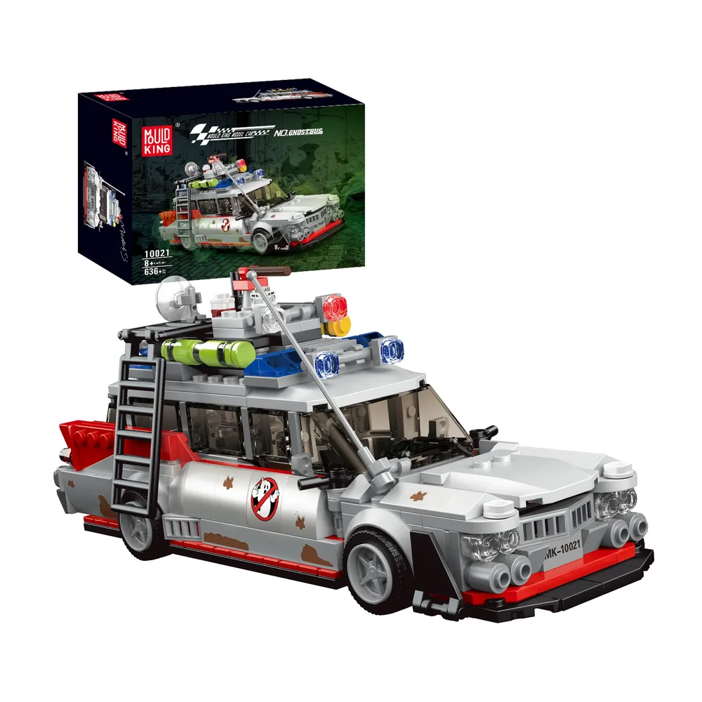 A studio shot of the Mould King Ghost Bus Model 10021 brick building set, featuring the completed Ecto-1 style vehicle with its detailed roof apparatus and the product box in the background, showcasing the model number 10021 and 636+ pieces.