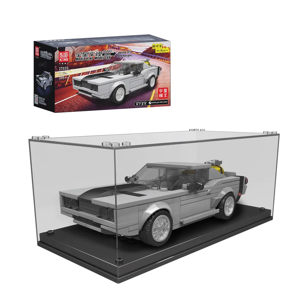 A Mould King Charger Muscle Car Model 27035 building block set displayed in a clear acrylic case next to its retail packaging box. The model is grey with black racing stripes.
