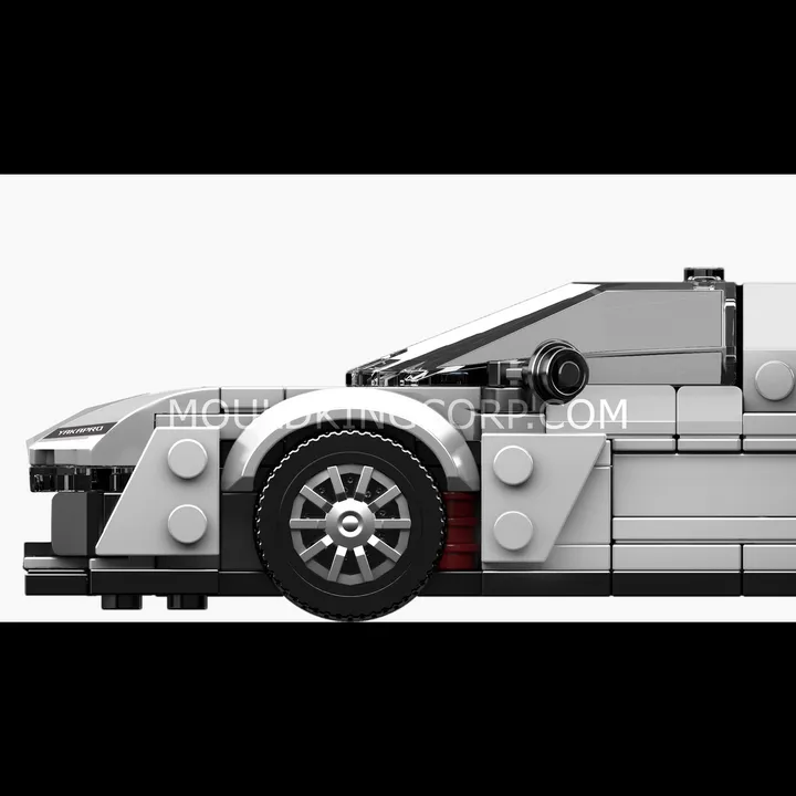 Close-up side view of the Mould King KC23 Supercar block model, focusing on the sleek body panels, realistic wheel arch, and intricately designed tire with rim details.
