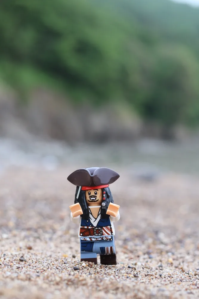 Jack Sparrow Running on the Beach: LEGO photography by Lewis Pritchard