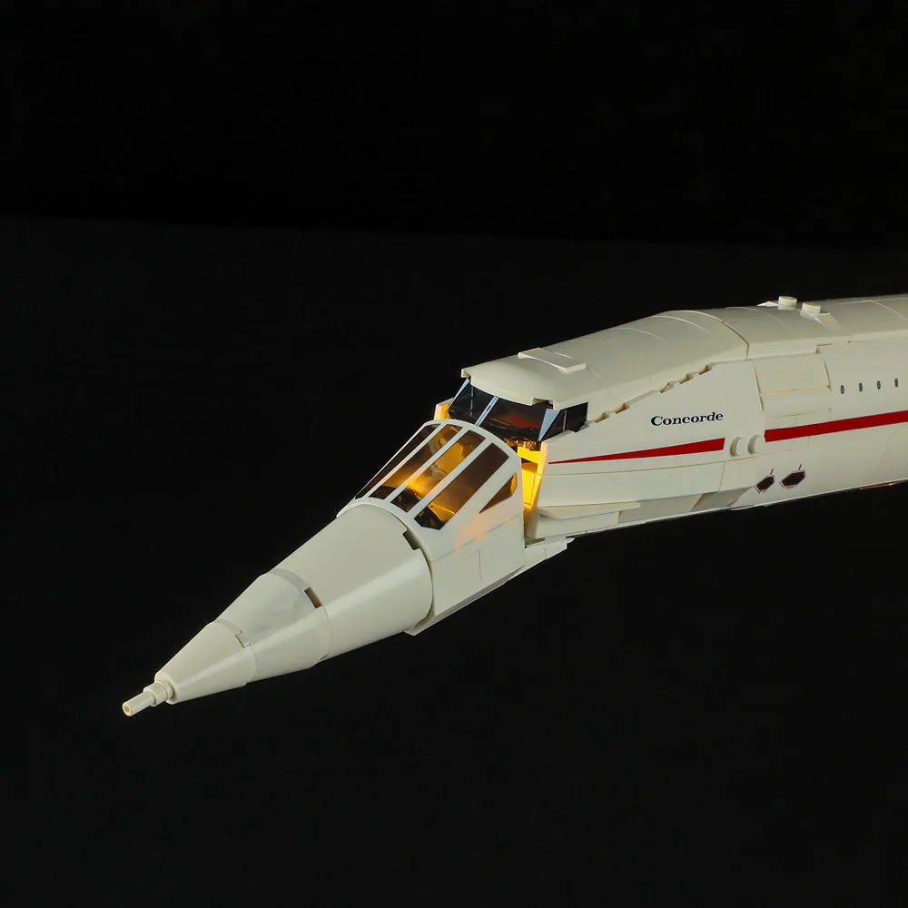 Lightailing Concorde with lit landing gear and fuselage