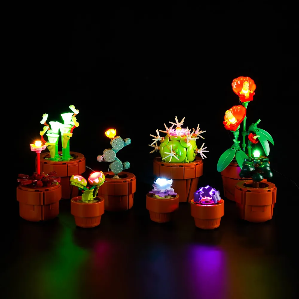 BrickBling LED upgrade for LEGO 10329 showcasing terracotta pots and cacti in glow