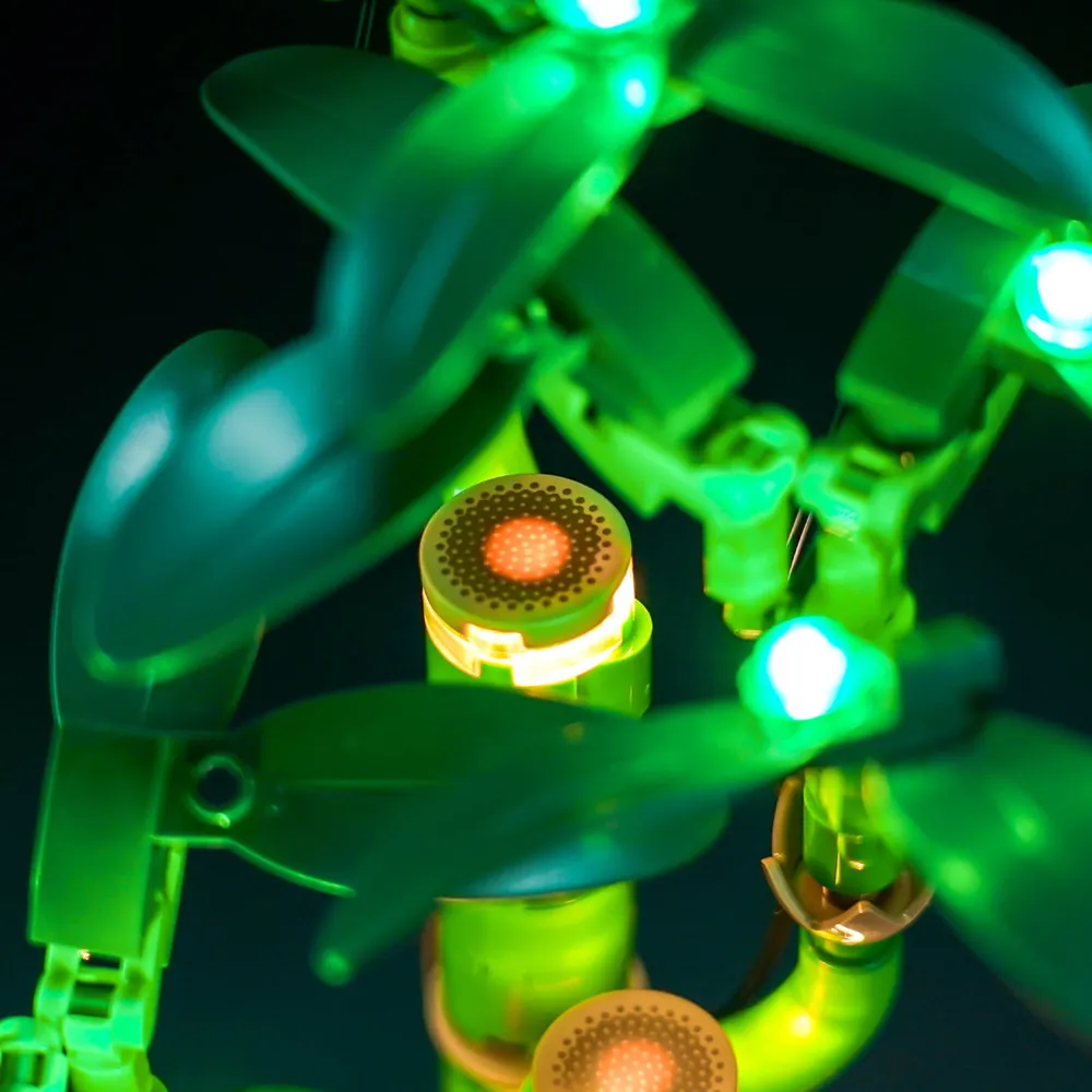 Close-up of BrickBling micro-LEDs hidden in the pot of LEGO 10344
