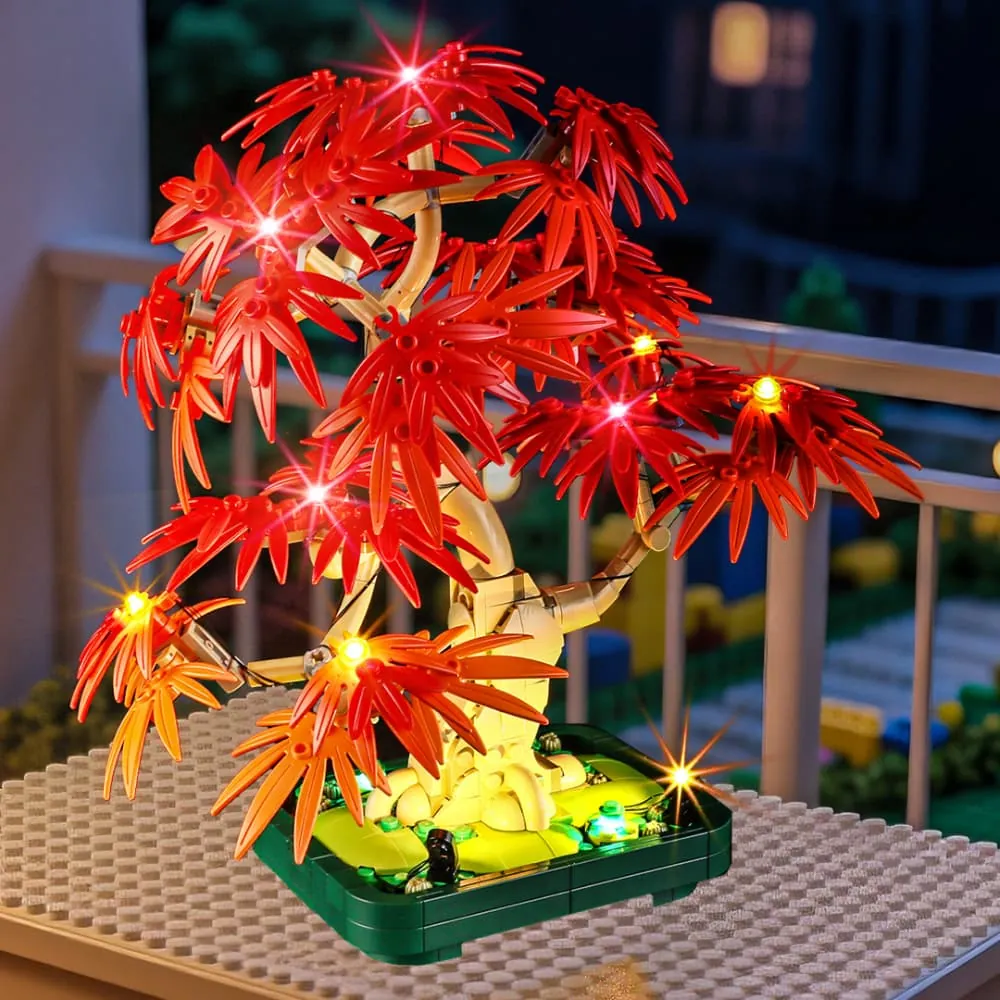 LEGO maple bonsai tree glowing with warm lights at night