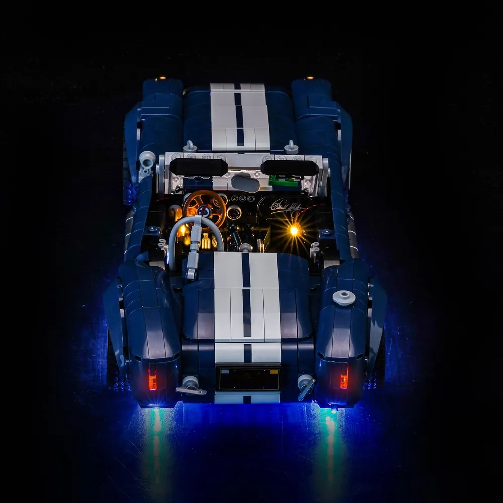Close-up of BrickBling micro-LED lights on LEGO Cobra front grille