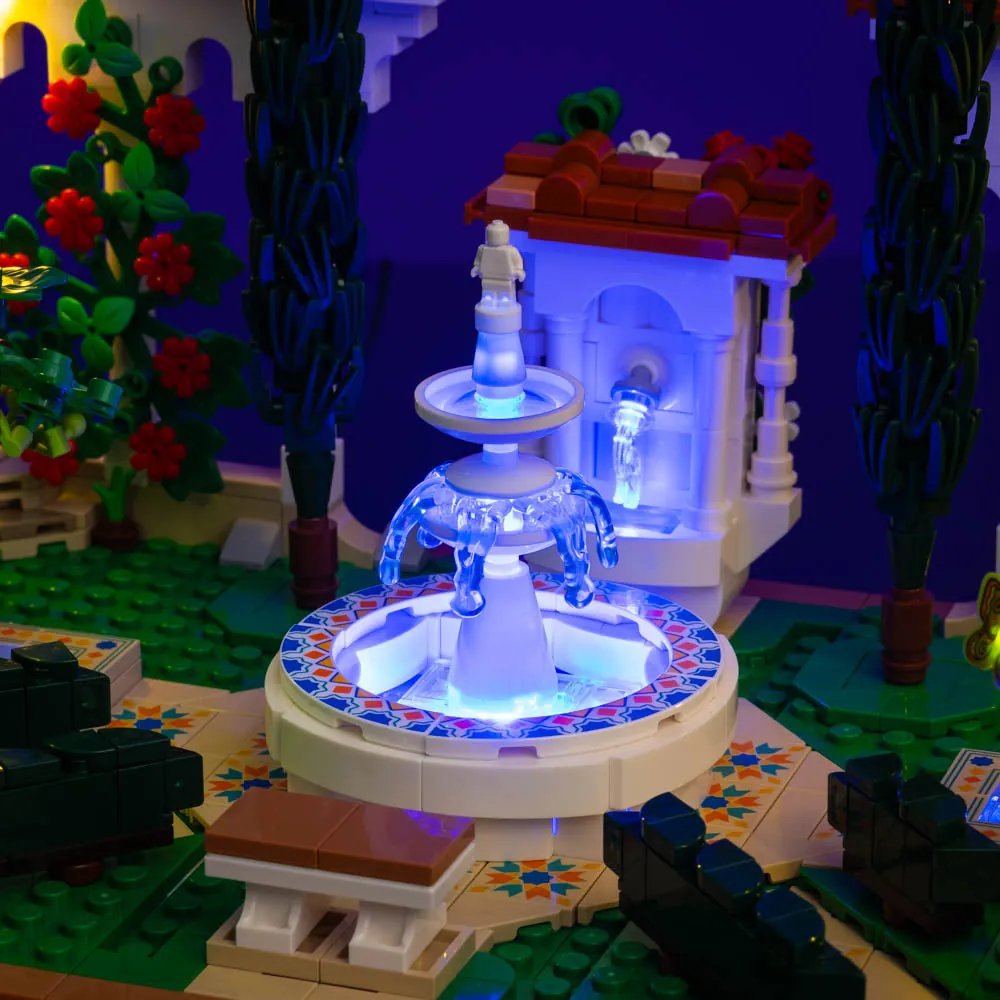 LightMyBricks lights highlighting the LEGO 10359 fountain and detailed architecture