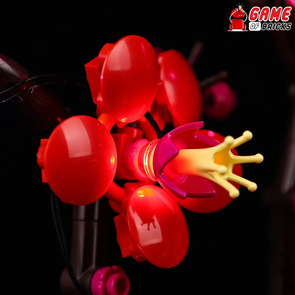 Game of Bricks LEDs illuminating the vase and branches