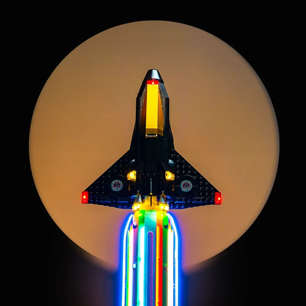 BrickBling light kit in a dark room showing the overall glow on LEGO Over the Moon set