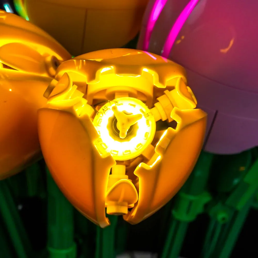 Close-up of BrickBling modular LED lights on LEGO tulip petals
