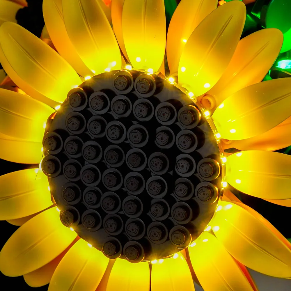 Close-up of BrickBling micro LEDs on sunflower stem