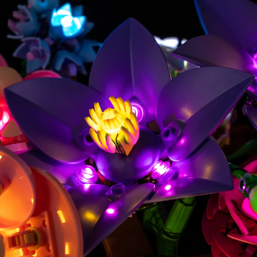 Illuminated floral panorama of LEGO Flower Wall with Game of Bricks LEDs