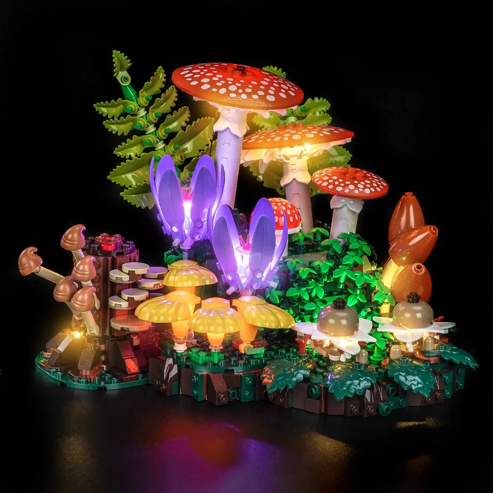 BrickBling LED kit lighting up the orange mushroom caps of LEGO Woodland Mushrooms 11505