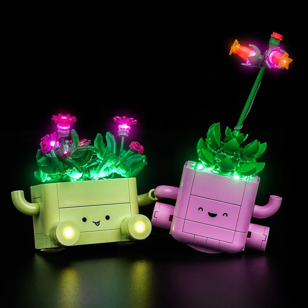 BrickBling LED kit gently lighting the pink flowers and smiling faces of LEGO Rocking Plants