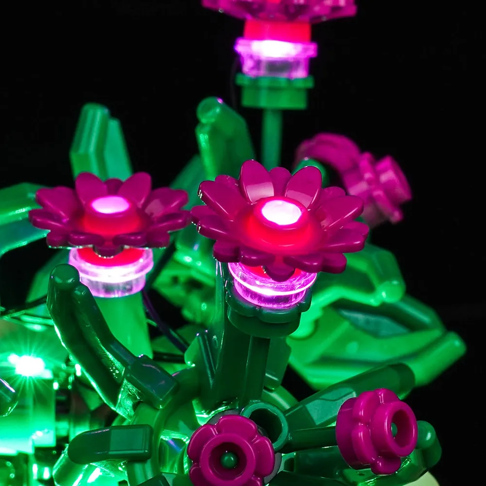 Close-up of BrickBling micro-LEDs hidden among the green leaves of LEGO Rocking Plants