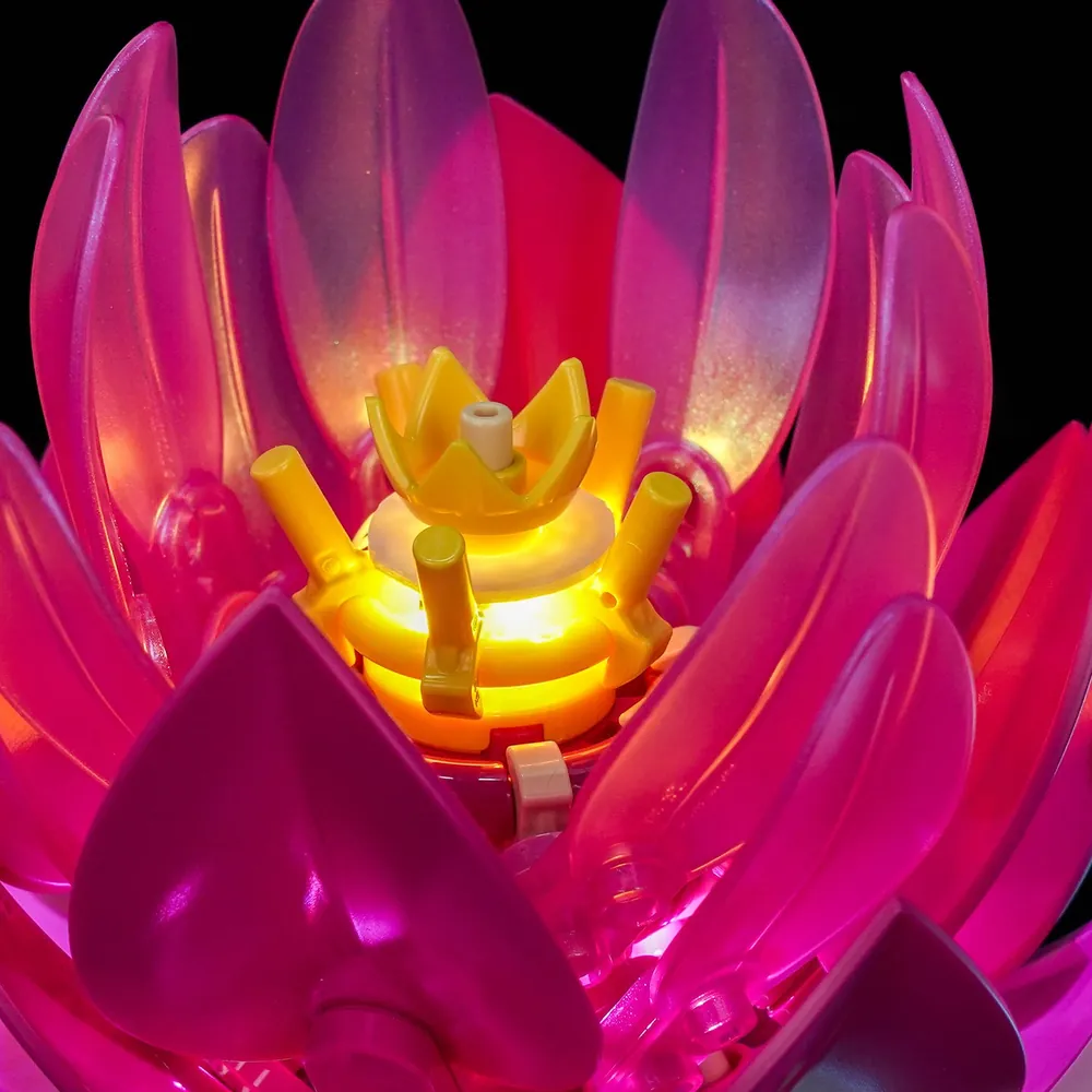Close-up of BrickBling modular micro-LEDs on LEGO Water Lilies 11511 stems