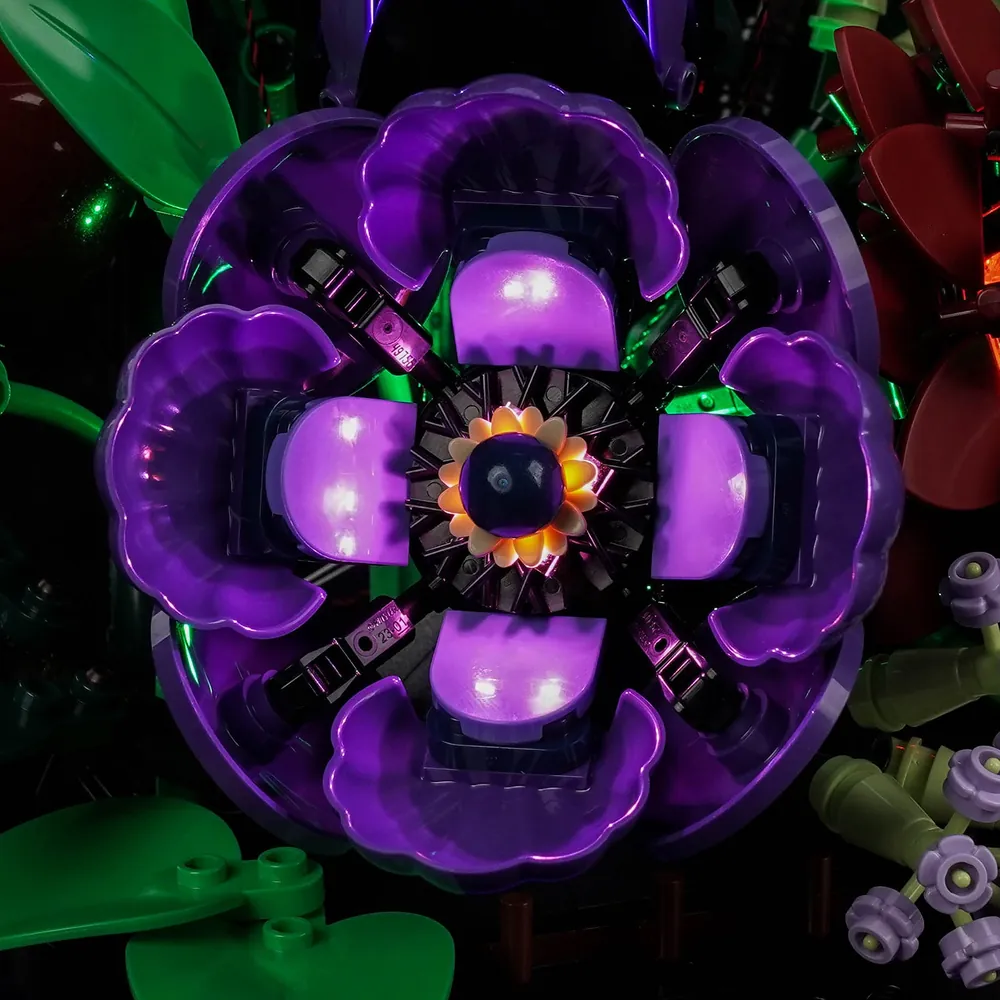 Close-up of BrickBling micro LEDs on LEGO black tulips inside the 11513 set