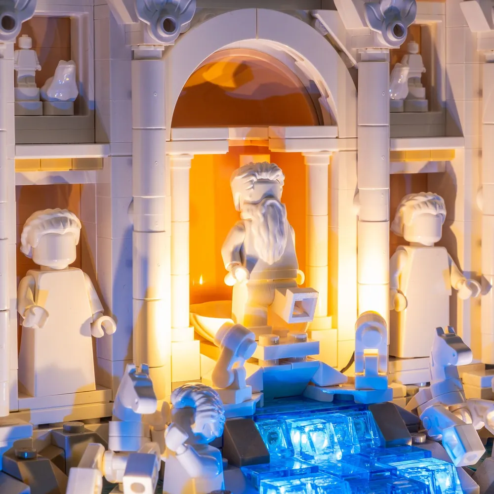 Close-up of LightMyBricks LEDs on the rockwork and water of the LEGO Trevi Fountain