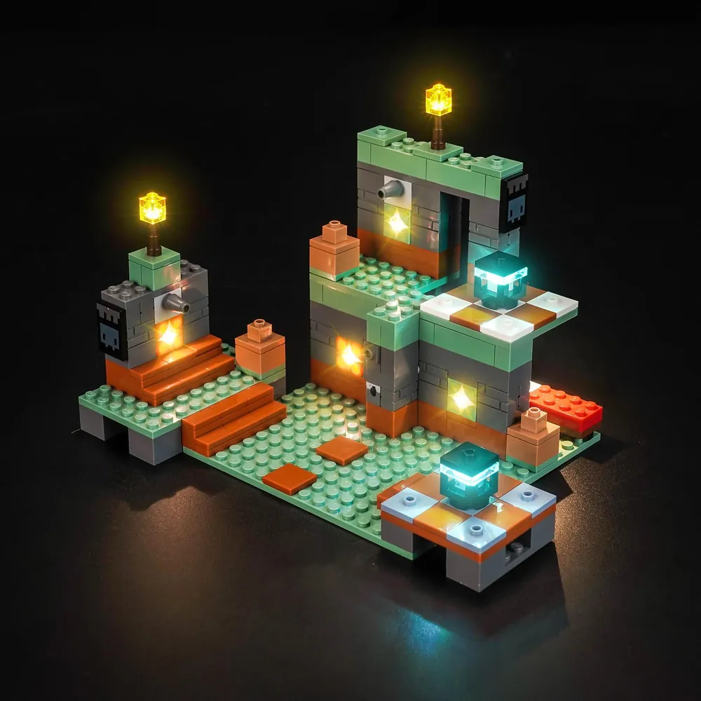 BrickBling LED kit for LEGO Minecraft Trial Chamber 21271 illuminating the cave interior with warm lights