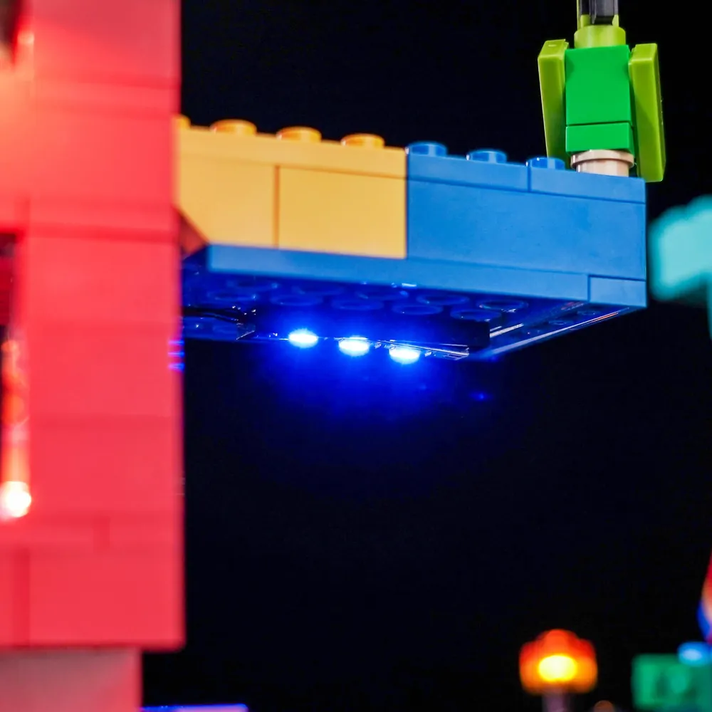LEGO Minecraft Parrot Houses 21282 with BrickBling lighting effect on the pond and foliage