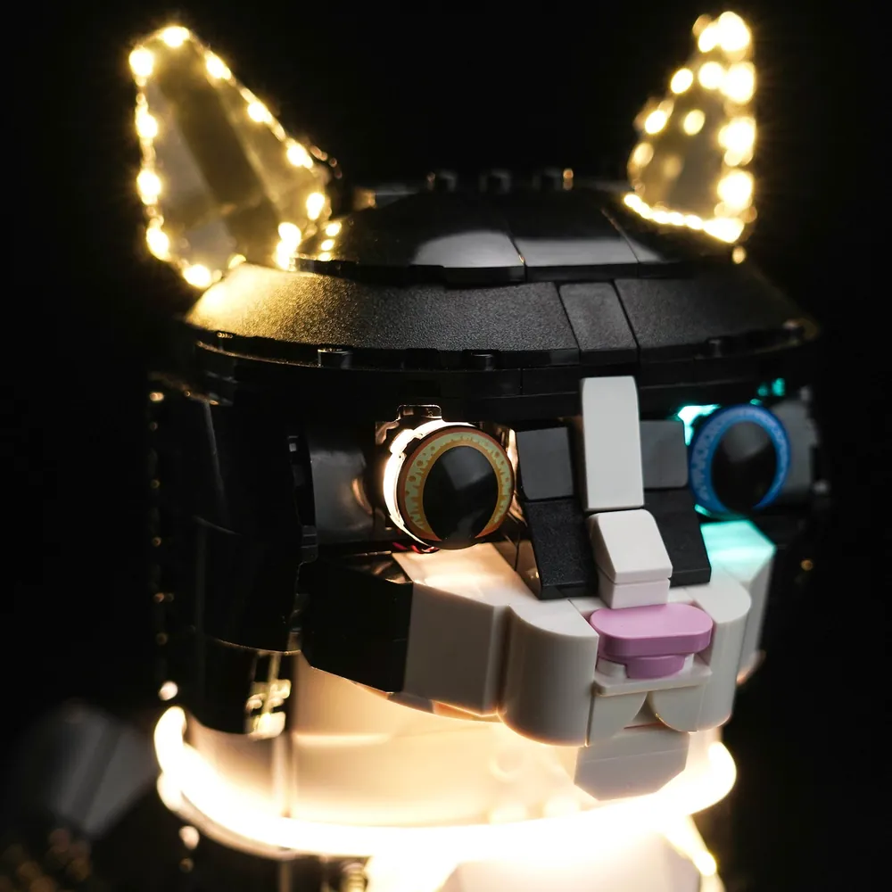 Close-up of BrickBling micro-LEDs illuminating the cat's face and eyes