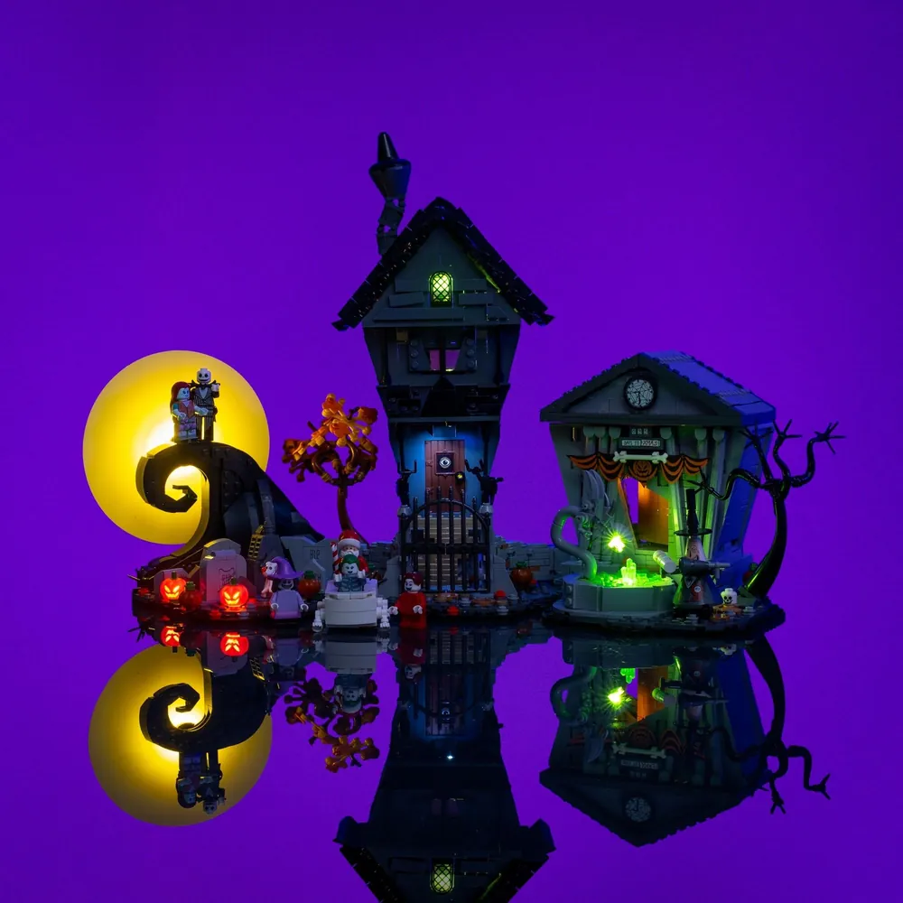 LightMyBricks LED kit for LEGO 21351 illuminating entire Halloween Town