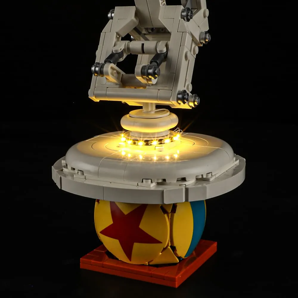 Lightailing harness concealed within Luxo Jr. base