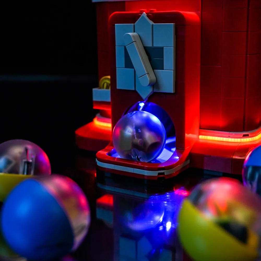Close-up of BrickBling micro-LED wiring on LEGO vending machine set 21358