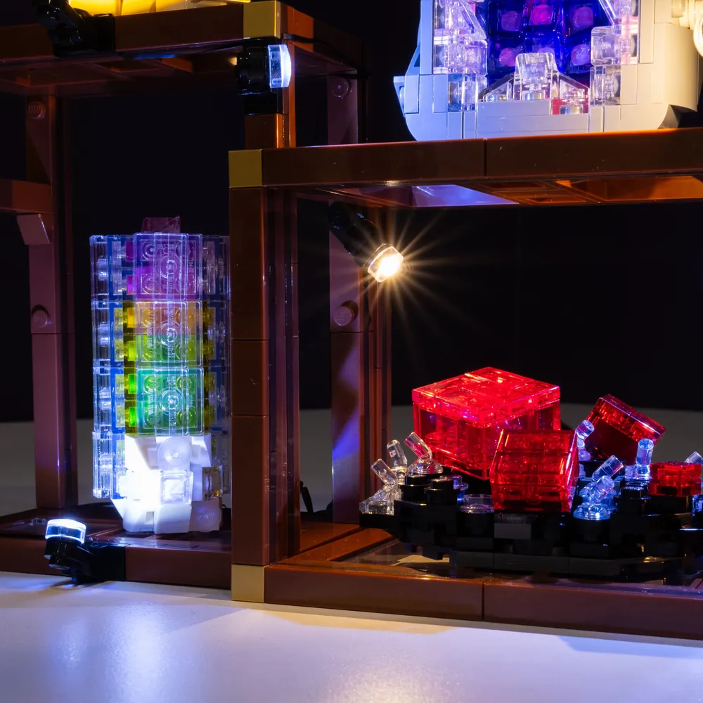 Light My Bricks kit highlighting red crystals and gold