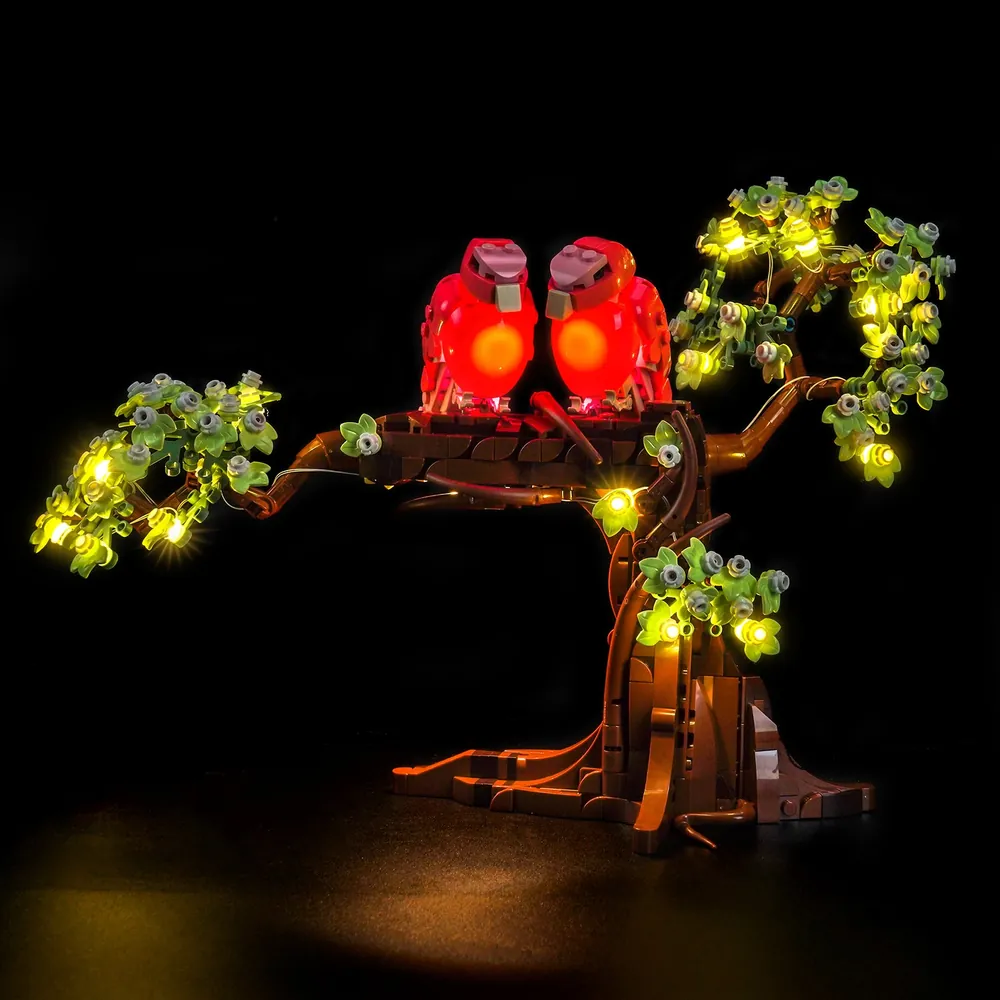BrickBling LED kit for LEGO Love Birds 21365 illuminating the entwined bodies with warm micro-LEDs