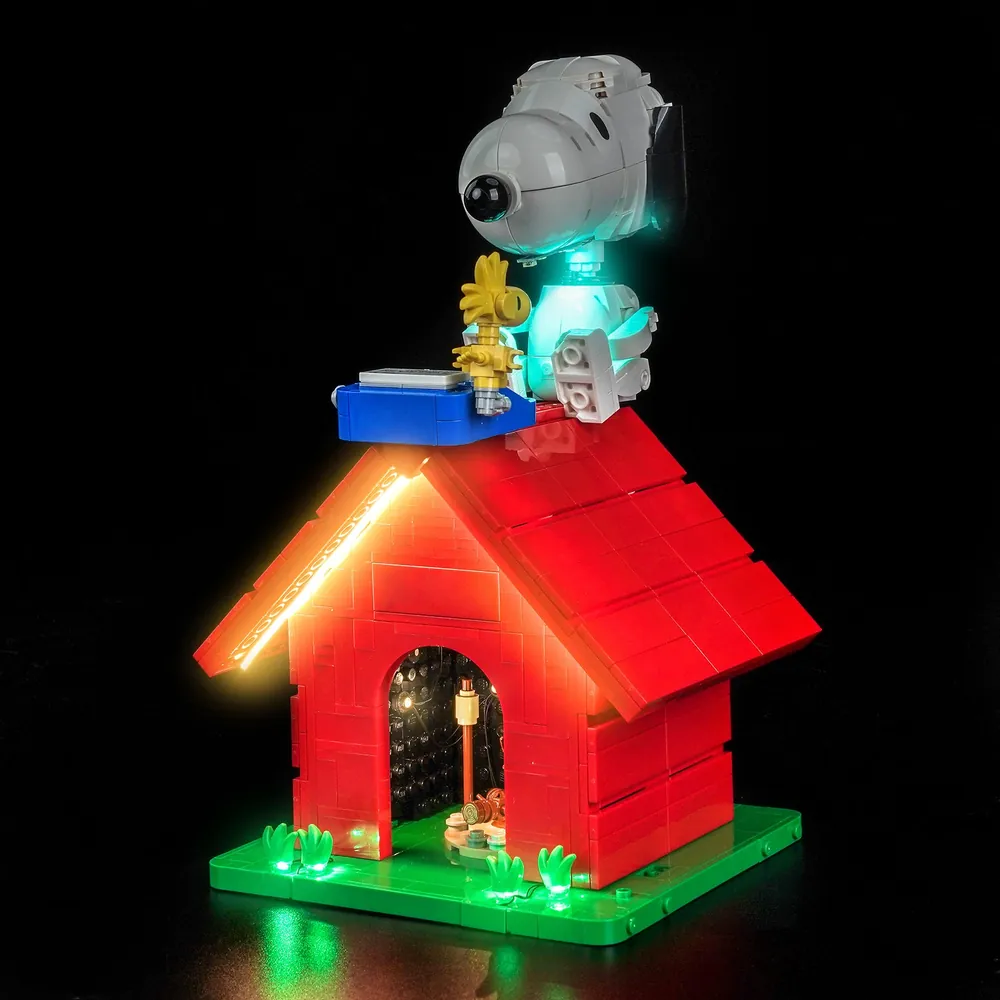 BrickBling LED kit for LEGO Snoopy's Doghouse 21368 illuminating the rooftop office and campfire scene