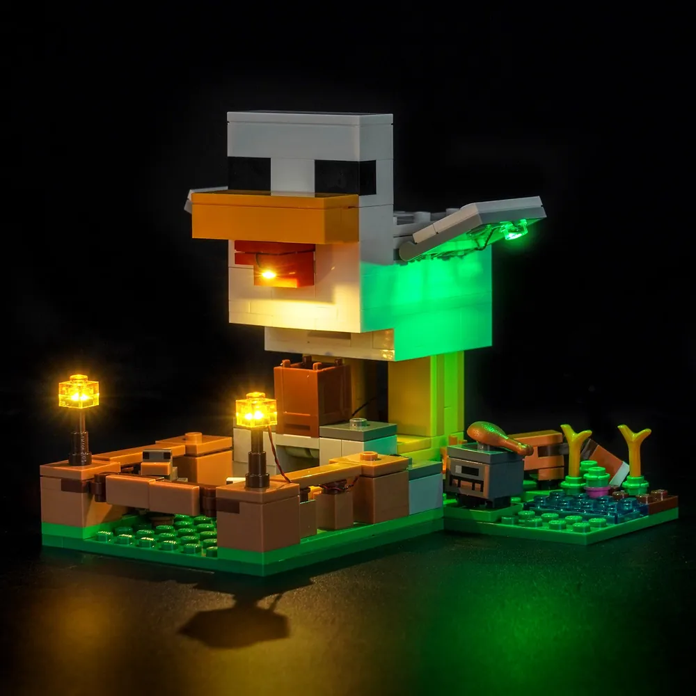 BrickBling LED lighting kit for LEGO Minecraft Chicken Farm 21585 with modular micro-LEDs illuminating the farmhouse and torches