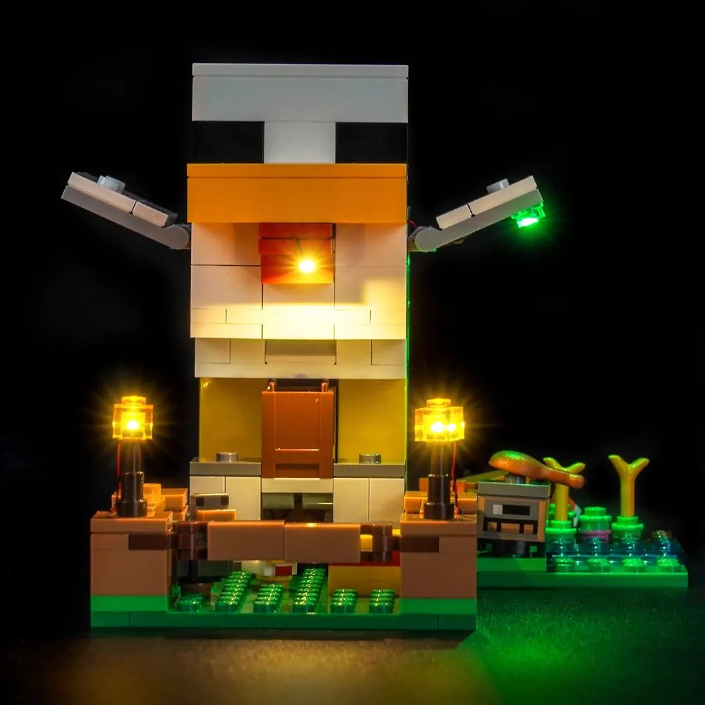 LEGO Minecraft Chicken Farm 21585 with BrickBling lighting installed showing torch and farmhouse glow