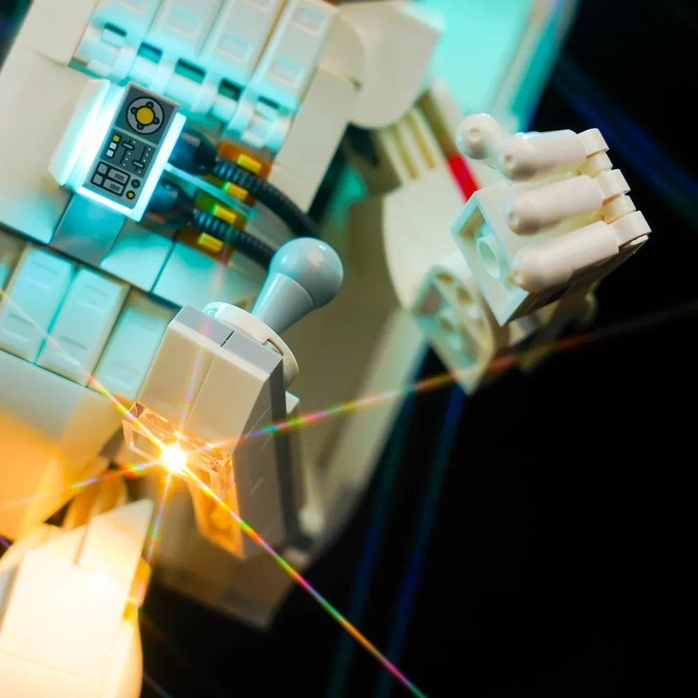 Close-up of BrickBling modular micro-LEDs on LEGO 31152 backpack