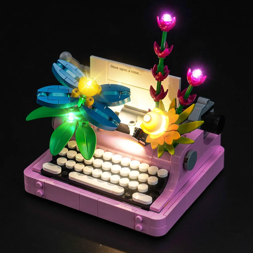 BrickBling LED kit for LEGO Creator Typewriter with Flowers 31169 glowing on a display shelf