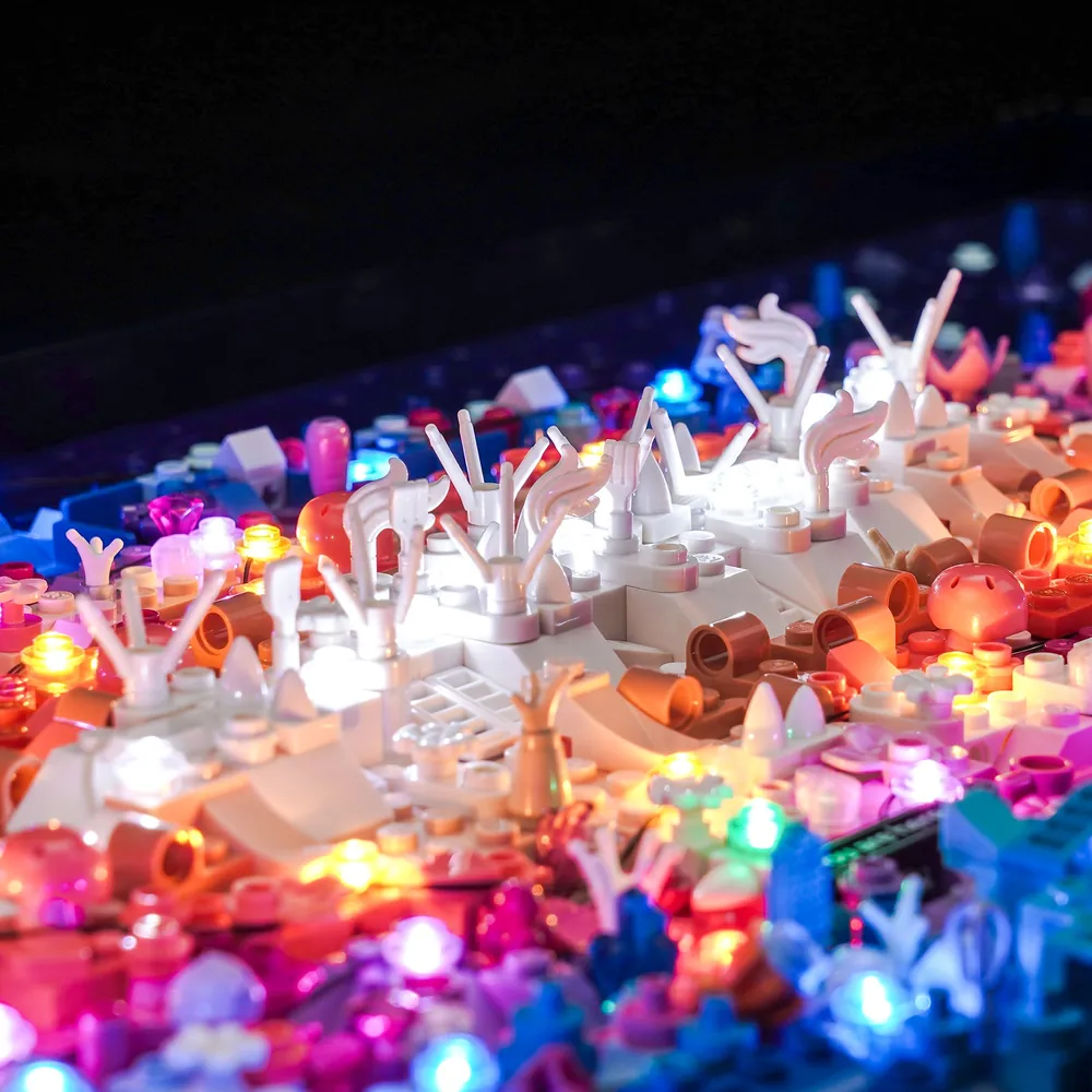 Close-up of BrickBling LED strips highlighting the central star cluster on the LEGO Art set