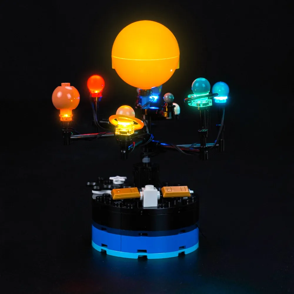 Close-up of micro-LEDs and thin wires inside the LEGO 31378 lighting installation