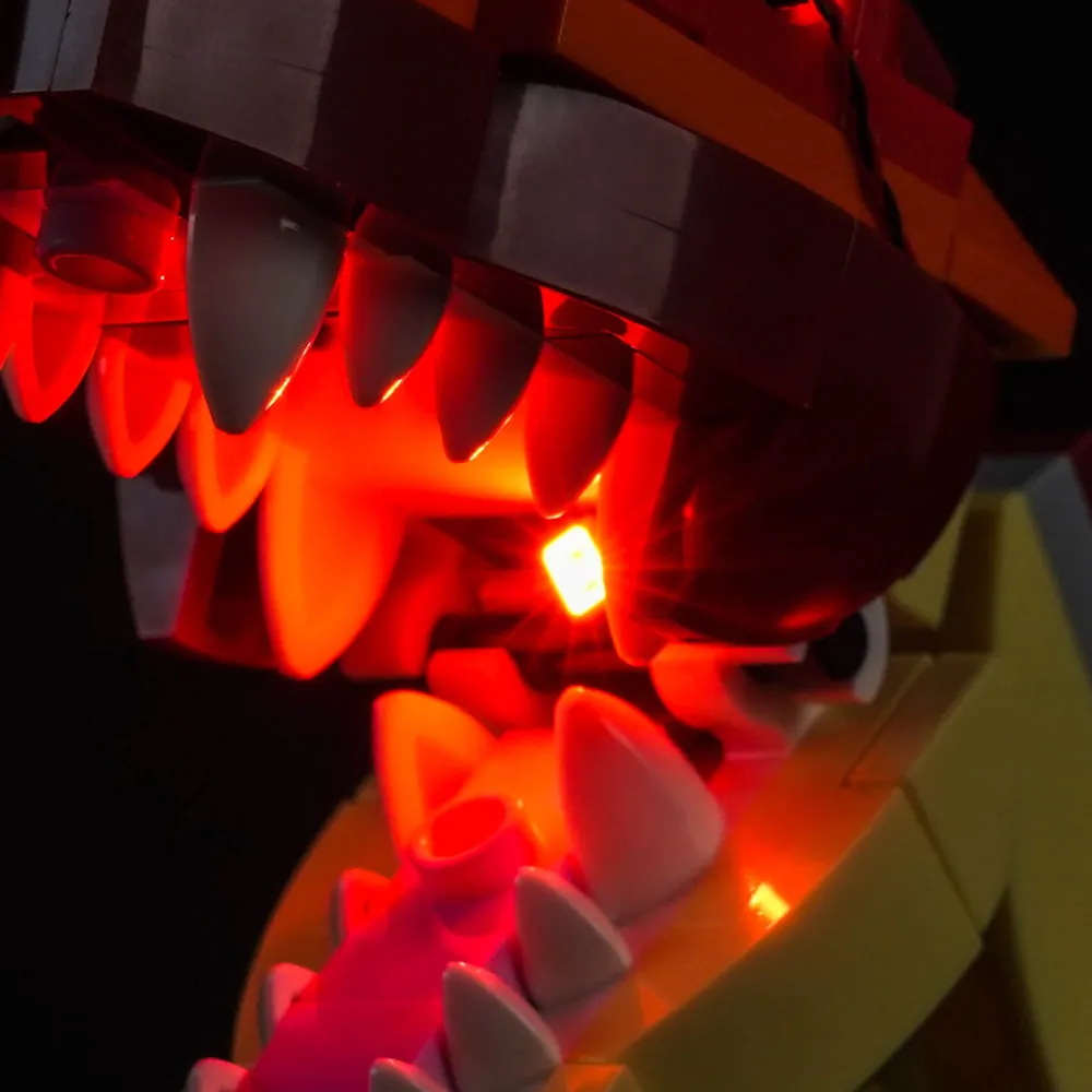 BrickBling micro-LEDs highlighting the stegosaurus's dark red back plates on the LEGO Creator 3-in-1
